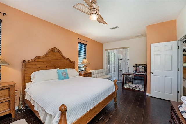 bedroom featuring ceiling fan and dark wood-type flooring