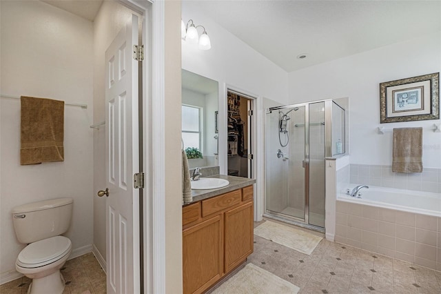 full bathroom featuring toilet, tile floors, vanity, and independent shower and bath