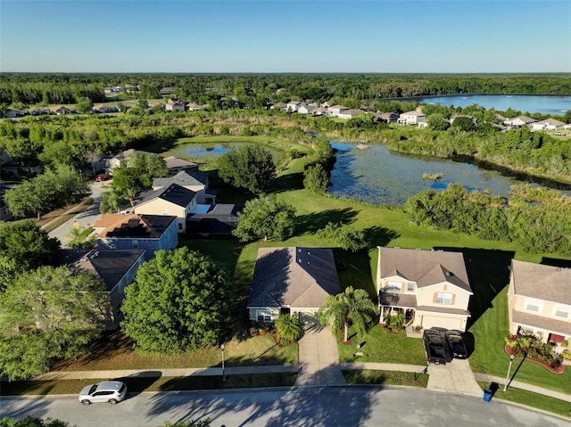 drone / aerial view with a water view