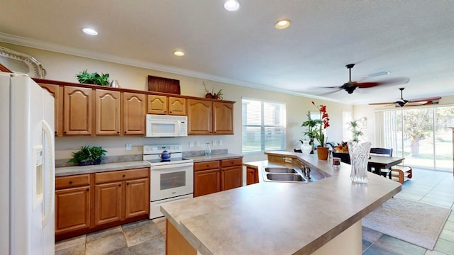 kitchen featuring a center island with sink, white appliances, ceiling fan, and light tile floors