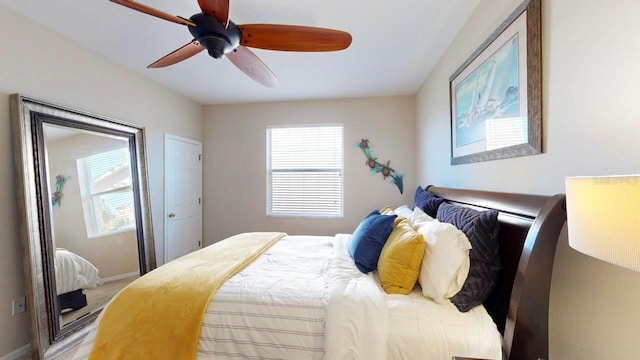 bedroom featuring ceiling fan and carpet floors