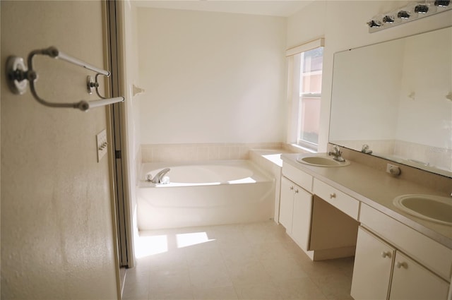 bathroom featuring tile floors, vanity with extensive cabinet space, double sink, and a bath