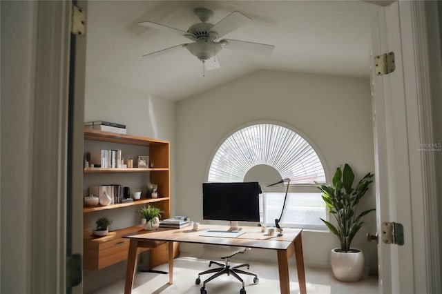 office area with lofted ceiling and ceiling fan