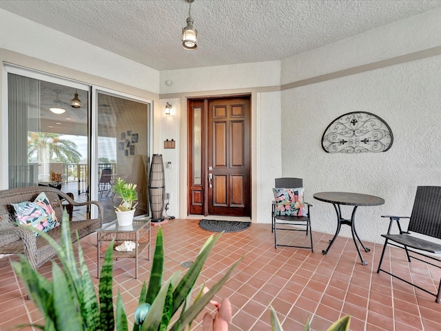 doorway to property featuring a patio