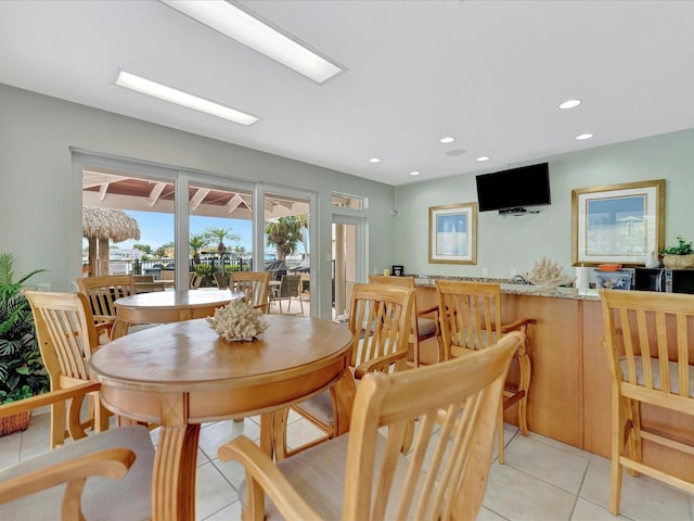 tiled dining room with french doors