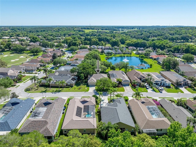 bird's eye view featuring a water view and a residential view