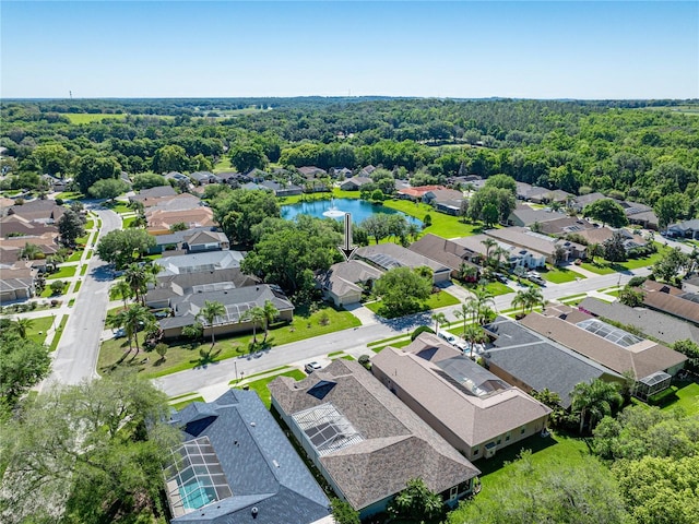 bird's eye view with a water view and a residential view