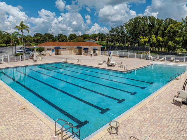 view of pool featuring a patio