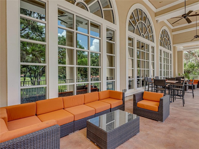 view of patio featuring outdoor dining area, outdoor lounge area, and ceiling fan