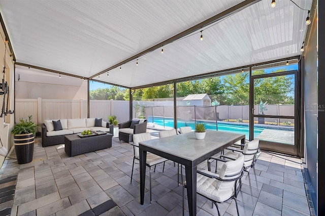 sunroom / solarium with rail lighting