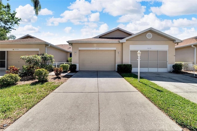 single story home with a garage