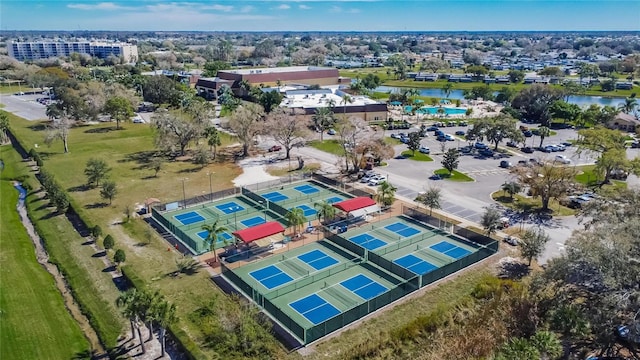 birds eye view of property with a water view