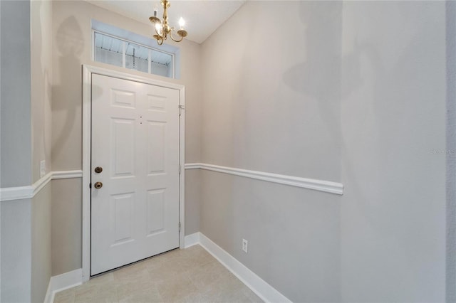 foyer featuring an inviting chandelier