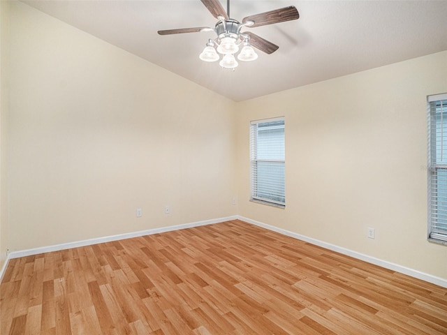 unfurnished room with ceiling fan and light wood-type flooring