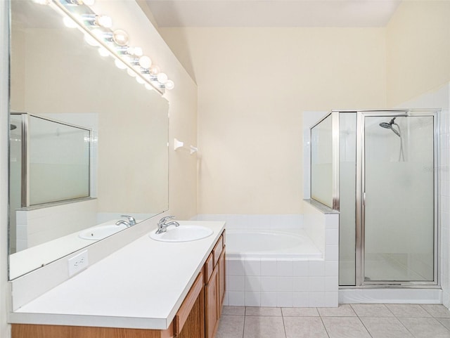 bathroom with vanity, plus walk in shower, and tile patterned floors