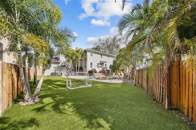 view of yard featuring a fenced in pool