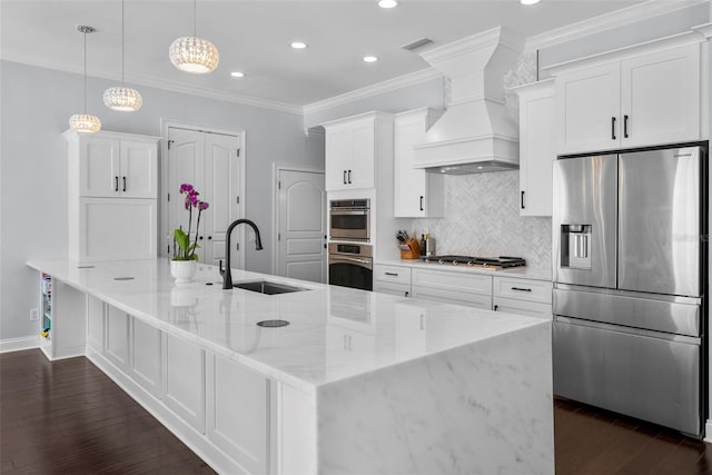 kitchen featuring light stone countertops, dark hardwood / wood-style flooring, stainless steel appliances, white cabinetry, and hanging light fixtures