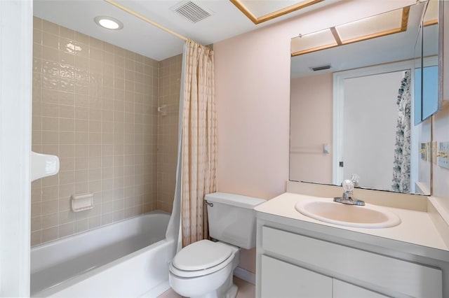 full bathroom featuring toilet, oversized vanity, and shower / bath combo with shower curtain