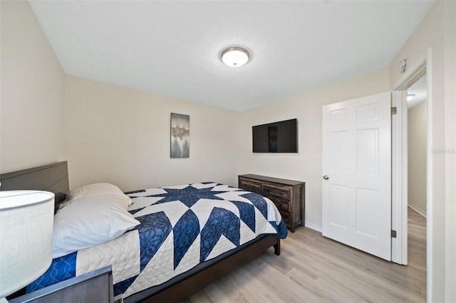 bedroom featuring light hardwood / wood-style flooring