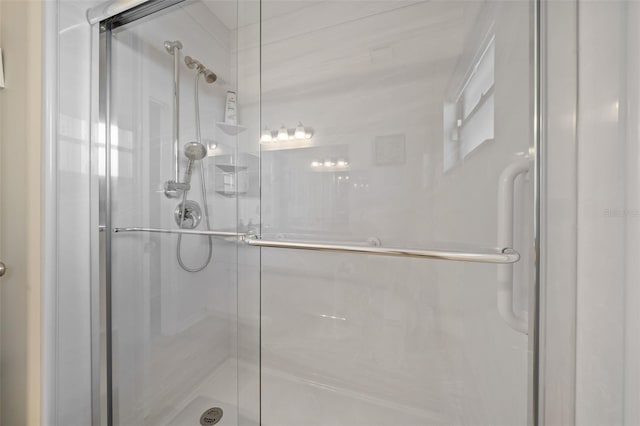 bathroom featuring an enclosed shower