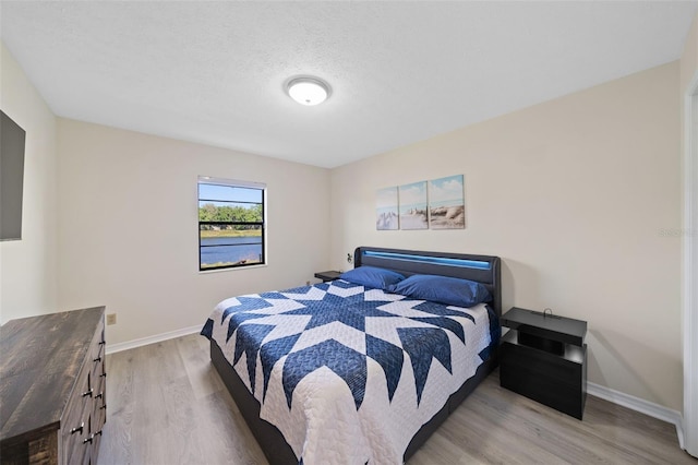 bedroom featuring light hardwood / wood-style floors