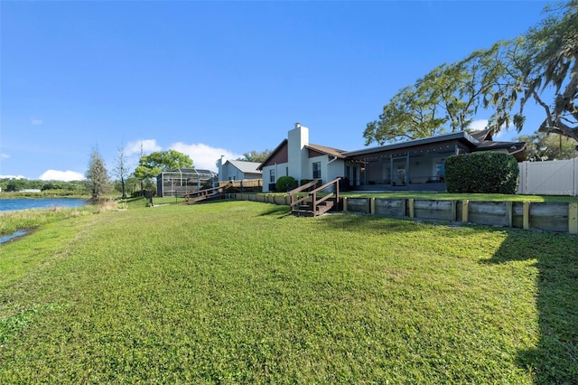 view of yard featuring a water view