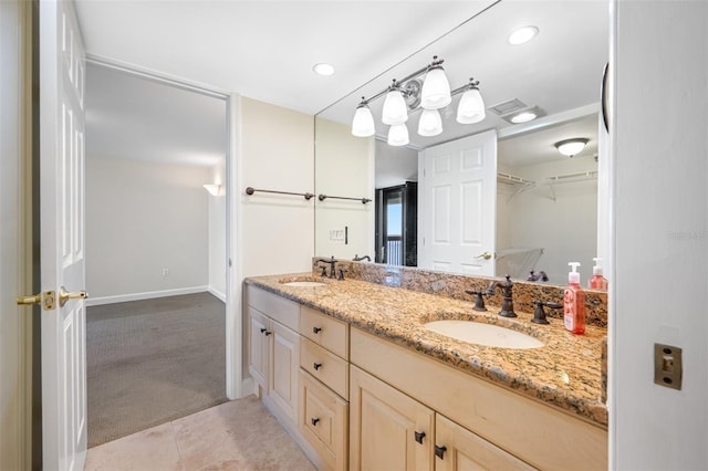 bathroom featuring vanity and tile patterned flooring