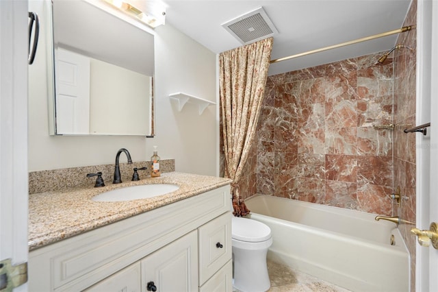 full bathroom featuring vanity, toilet, and shower / tub combo