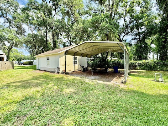 view of parking featuring a carport and a yard