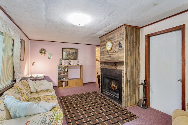 carpeted living room featuring wood walls, ornamental molding, and a large fireplace