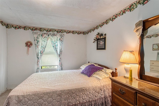 bedroom featuring carpet flooring