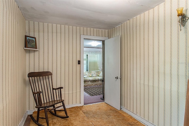 sitting room with light tile floors