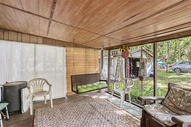 sunroom with wooden ceiling