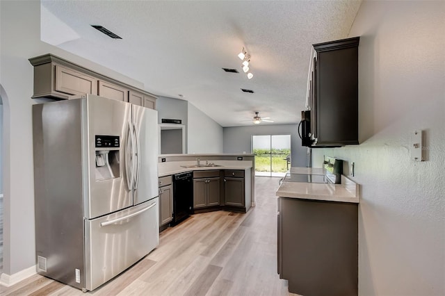 kitchen featuring ceiling fan, rail lighting, light hardwood / wood-style flooring, dishwasher, and stainless steel refrigerator with ice dispenser