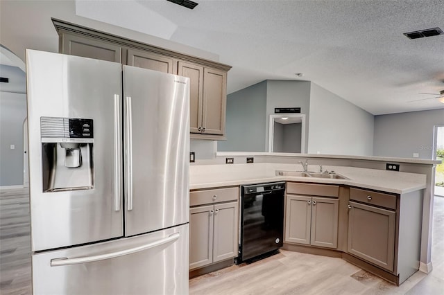 kitchen with light hardwood / wood-style floors, ceiling fan, stainless steel fridge, dishwasher, and sink