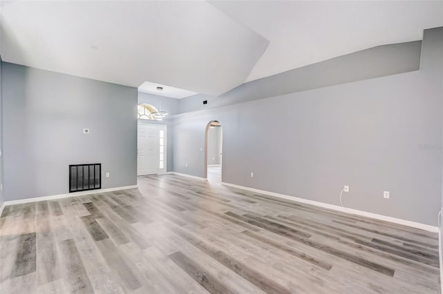 unfurnished room with light hardwood / wood-style floors