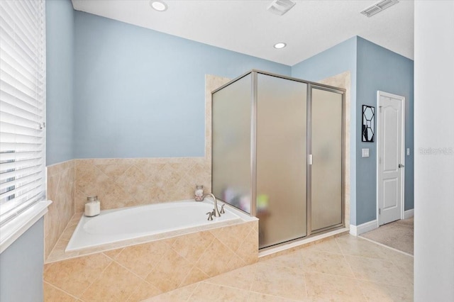 bathroom featuring separate shower and tub and tile patterned floors