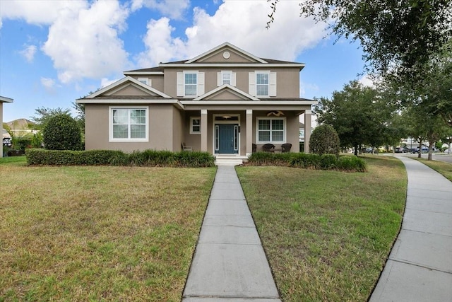 view of front of home with a front lawn