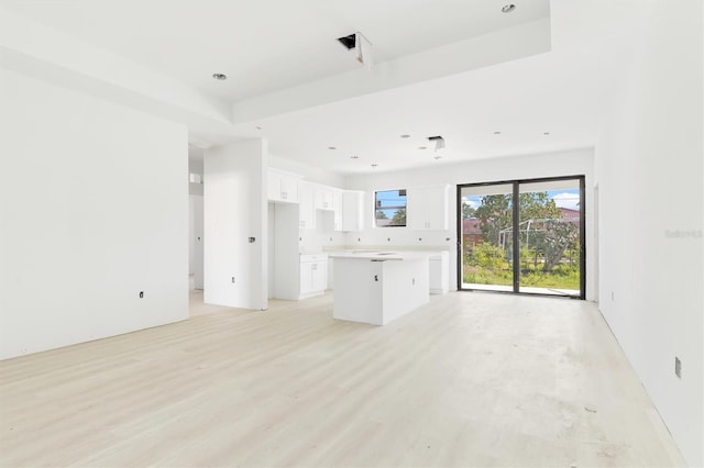 unfurnished living room featuring light hardwood / wood-style floors