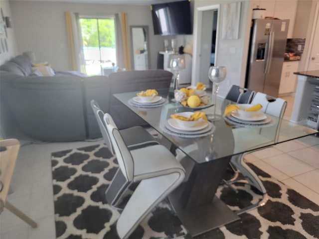 dining area featuring tile floors