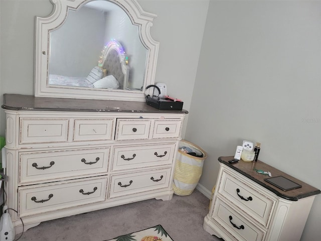 room details featuring light carpet and vanity