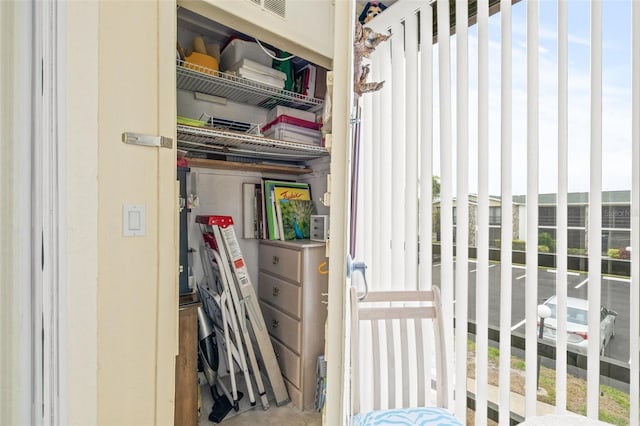 interior space featuring a closet and multiple windows