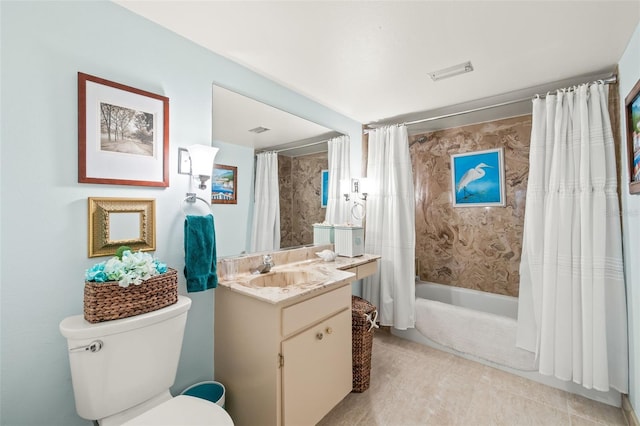 full bathroom with toilet, tile floors, vanity, and shower / tub combo with curtain