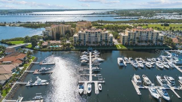 birds eye view of property featuring a water view