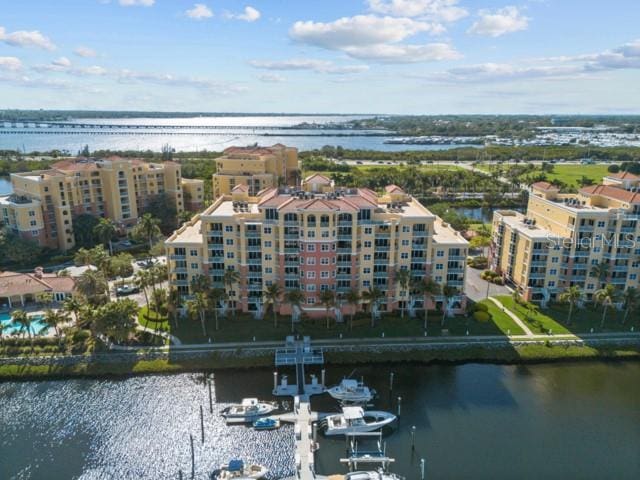 birds eye view of property featuring a water view