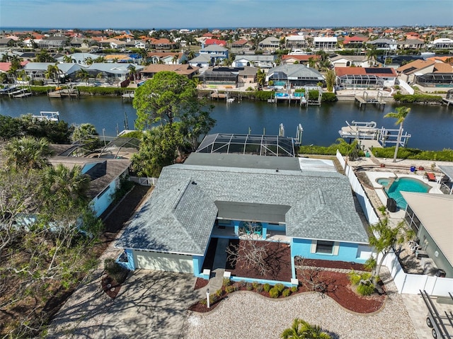 drone / aerial view with a water view