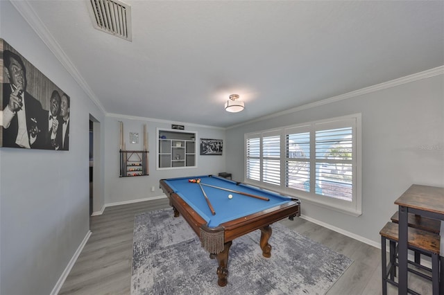 rec room with hardwood / wood-style flooring, billiards, and crown molding