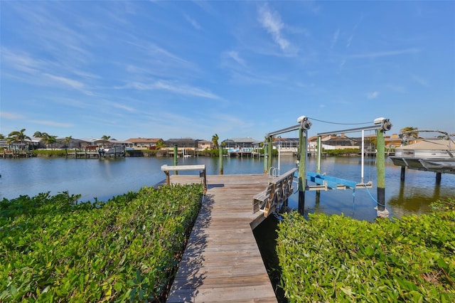 view of dock with a water view