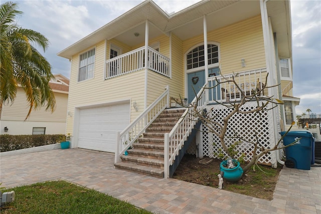 view of front of property with a garage