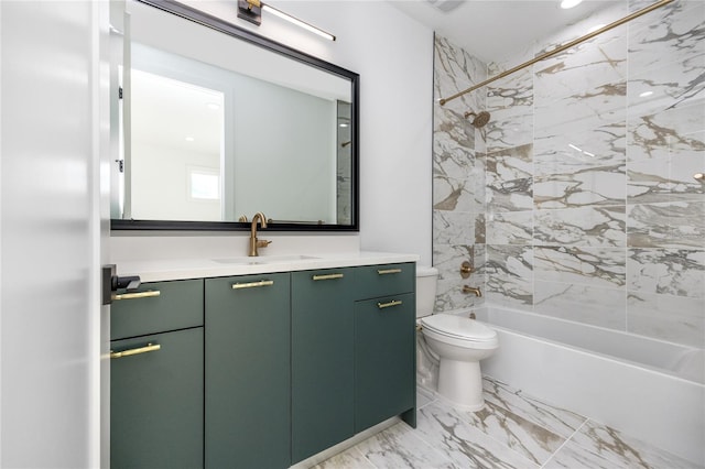 full bathroom with tiled shower / bath combo, toilet, and vanity